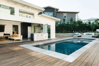 a pool deck in a modern home