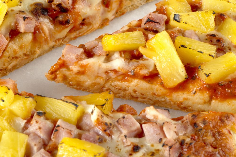 Slices of Hawaiian pizza.