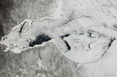 In this NASA satellite taken on April 6, sea ice covers most of Canada's Hudson Bay and snow blankets the surrounding land.