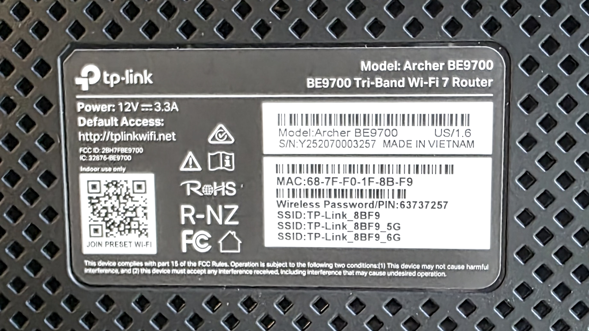 The information label on a TP-Link Archer BE9700 router