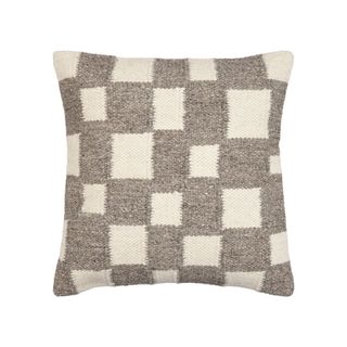 A pillow with broken checked pattern