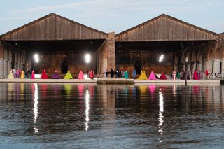 Multi-artist installation next to a lagoon