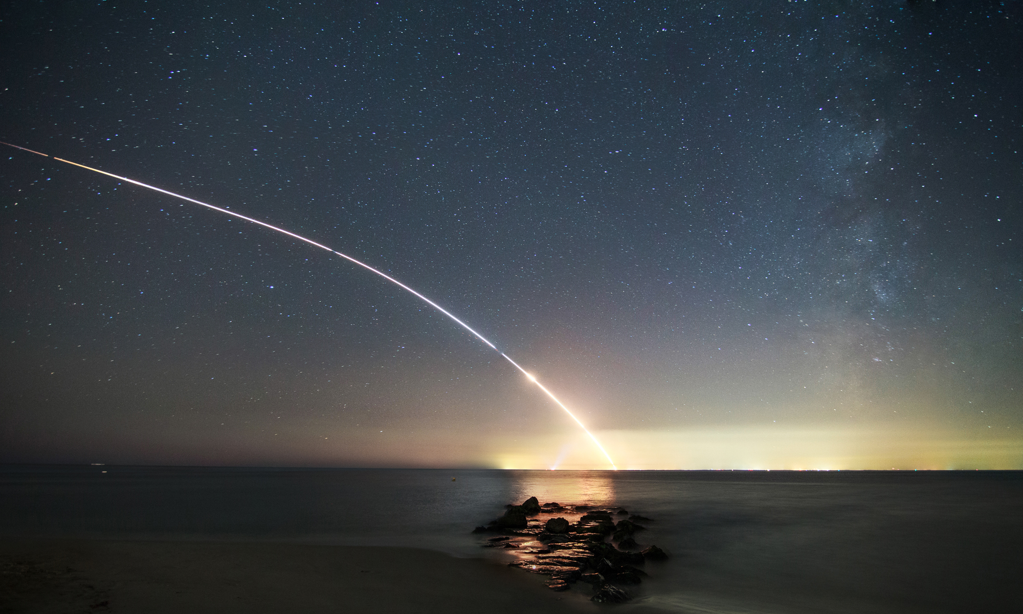 Photographer Chris Bakley captured this stunning image of NASA&#039;s LADEE moon probe launch from the beach in Cape May Point, N.J., on Sept. 6, 2013. 