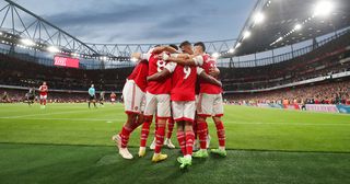 A general view as Gabriel Jesus of Arsenal celebrates scoring their side's first goal with teammates during the Premier League match between Arsenal FC and Aston Villa at Emirates Stadium on August 31, 2022 in London, England.