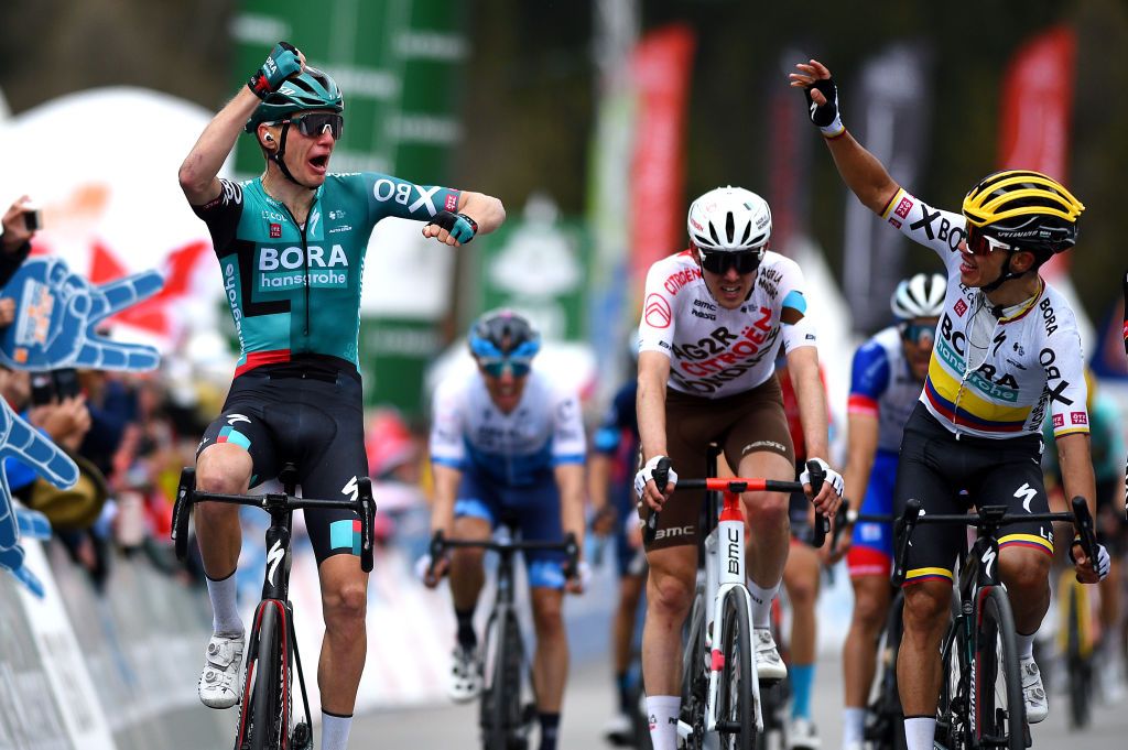 ZINAL VAL DANNIVIERS SWITZERLAND APRIL 30 LR Aleksander Vlasov of Russia and Bora Hansgrohe Team and Sergio Andres Higuita Garcia of Colombia and Bora Hansgrohe Team celebrate and discuss at finish line during the 75th Tour De Romandie 2022 Stage 4 a 1801km stage from Aigle to Zinal Val dAnniviers 1664m TDR2022 on April 30 2022 in Zinal Val dAnniviers Switzerland Photo by Dario BelingheriGetty Images