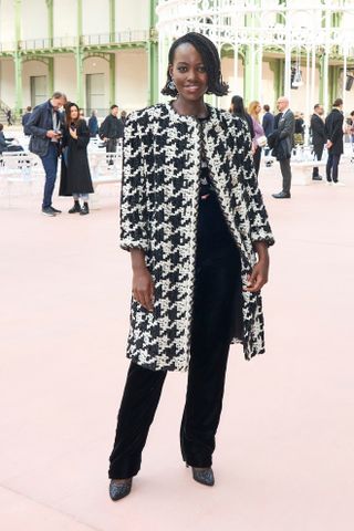 Lupita Nyong'o at the Spring Summer 2025 runway show at the Grand Palais during Paris Fashion Week.