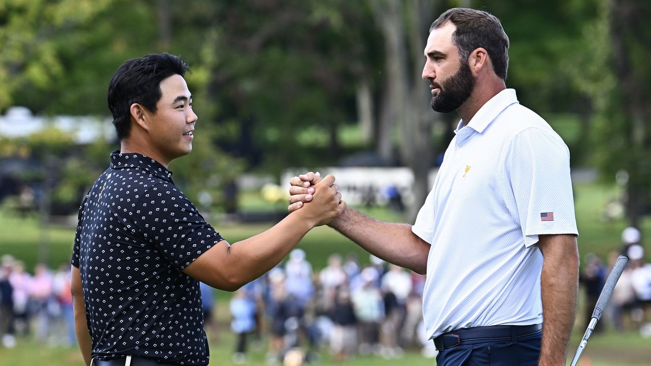 Tom Kim and Scottie Scheffler shake hands after a clash at the Presidents Cup