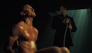 Daniel Craig sits in a chair as he's tortured by Mads Mikkelsen in Casino Royale.
