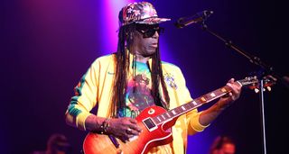 Junior Marvin plays a Gibson Les Paul live onstage in New York