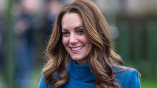 Catherine, Duchess of Cambridge smiles as she meets schoolchildren and teachers at Holy Trinity Church of England First School in Berwick-Upon-Tweed, north-east England