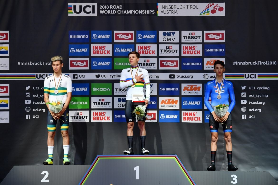 The Belgian national anthem plays out on the podium
