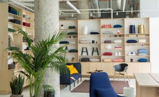 Display shelving and chairs inside Hem popup store