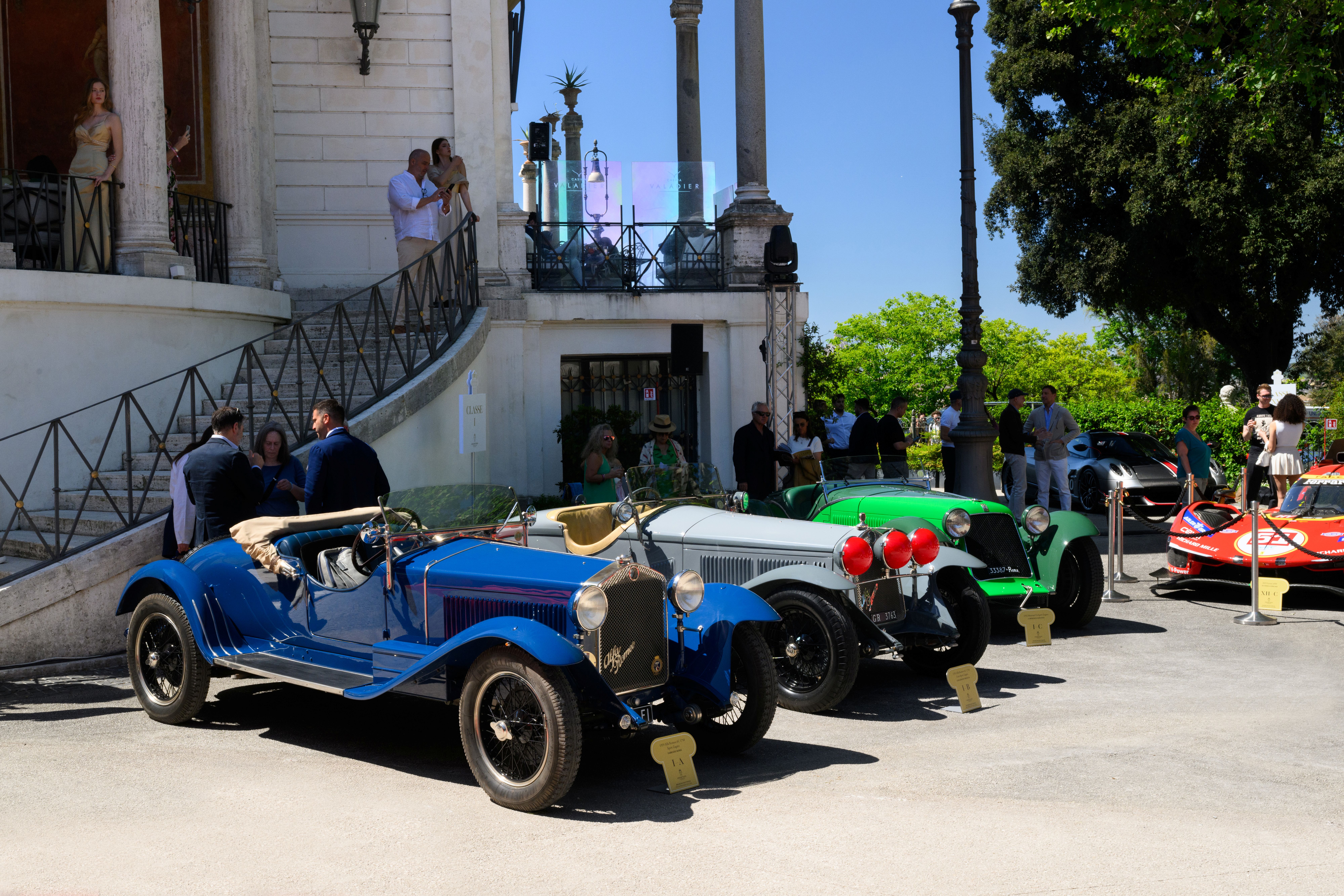 Historic Alfa Romeos, Ferraris, a Bizzarrini and a Lamborghini Miura are displayed and driven through Rome during Anantara Concorso Roma, celebrating automotive design and heritage.