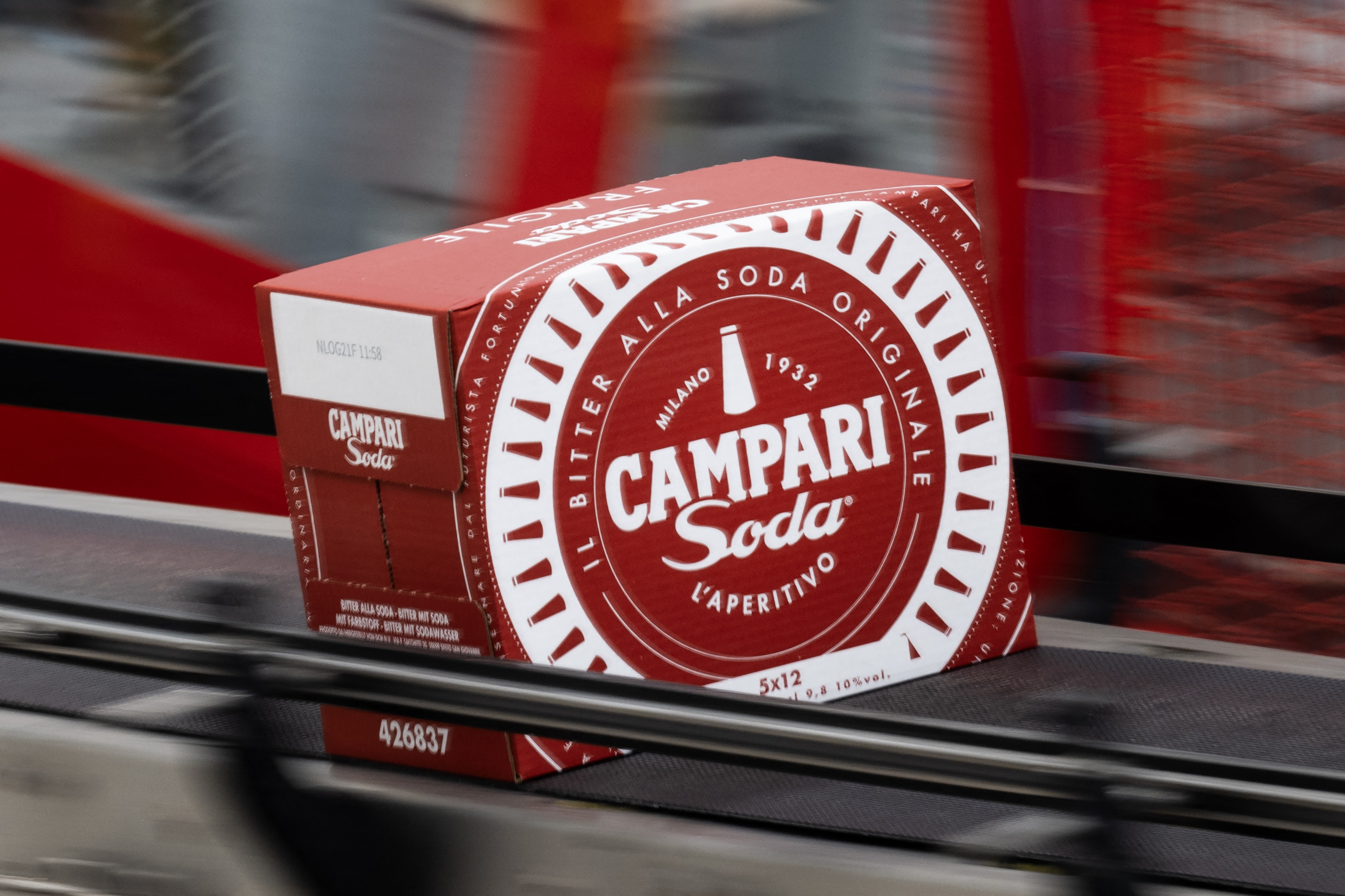 A box of the Italian alcoholic aperitif Campari Soda is pictured on the production line in the Campari Group facility in Novi Ligure, near Alessandria, northern Italy, on July 21, 2026