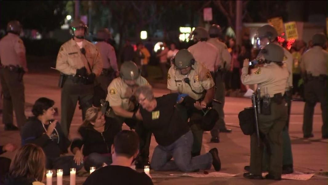 Walmart workers protest against retaliation and in favor of higher wages