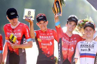 PARIS FRANCE JULY 18 Pello Bilbao of Spain Sonny Colbrelli of Italy Dylan Teuns of Belgium Matej Mohori of Slovenia Polka Dot Mountain Jersey Fred Wright of The United Kingdom and Team Bahrain Victorious celebrate at podium Best Team Trophy during the 108th Tour de France 2021 Stage 21 a 1084km stage from Chatou to Paris Champslyses LeTour TDF2021 on July 18 2021 in Paris France Photo by Michael SteeleGetty Images