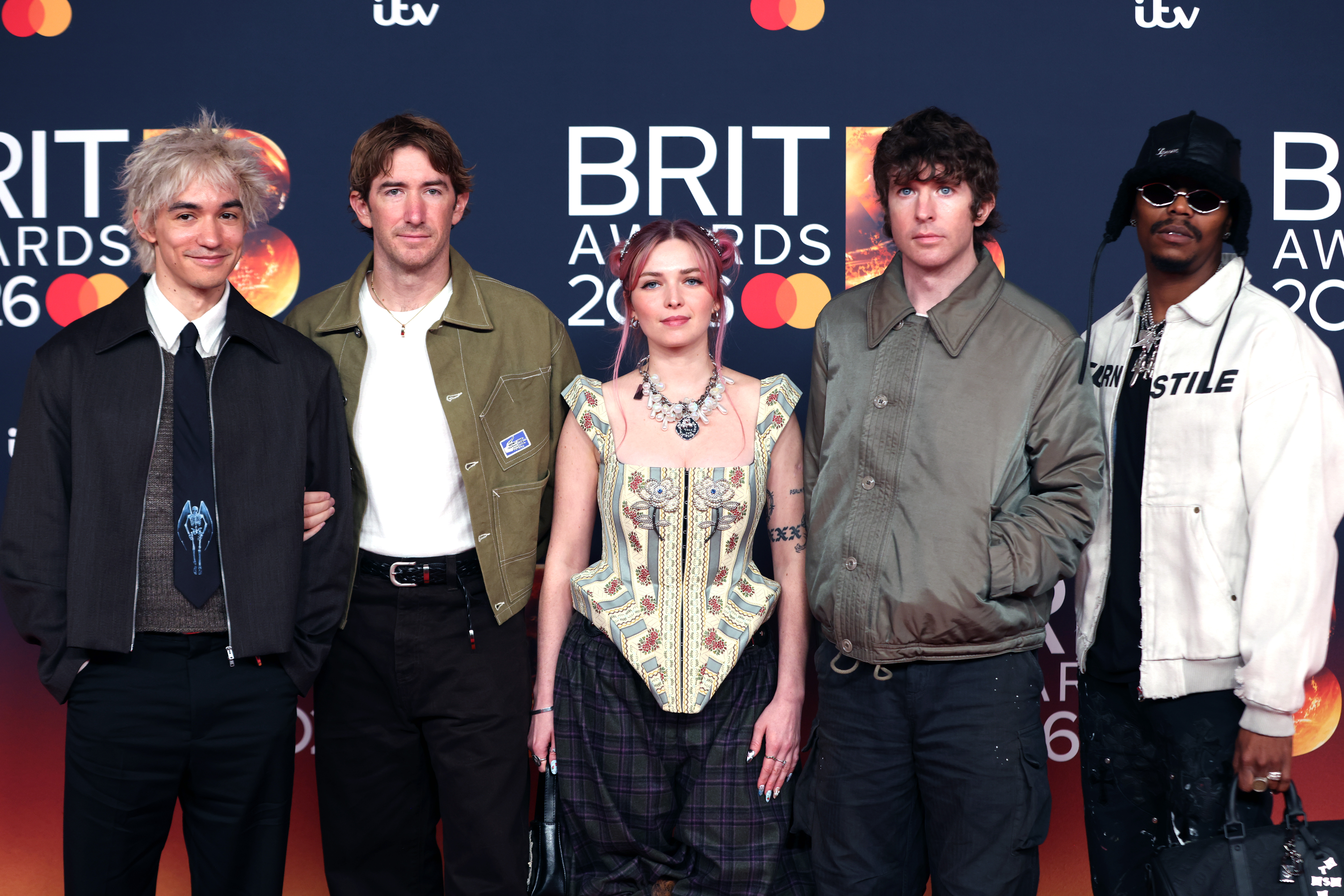 (L-R) Ellis Durand, Henry Holmes, Rhian Teasdale, Josh Mobaraki and Hester Chambers of Wet Leg attend The BRIT Awards 2026 at Co-op Live on February 28, 2026 in Manchester, England