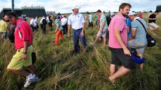 Matt Kuchar looking for a golf ball