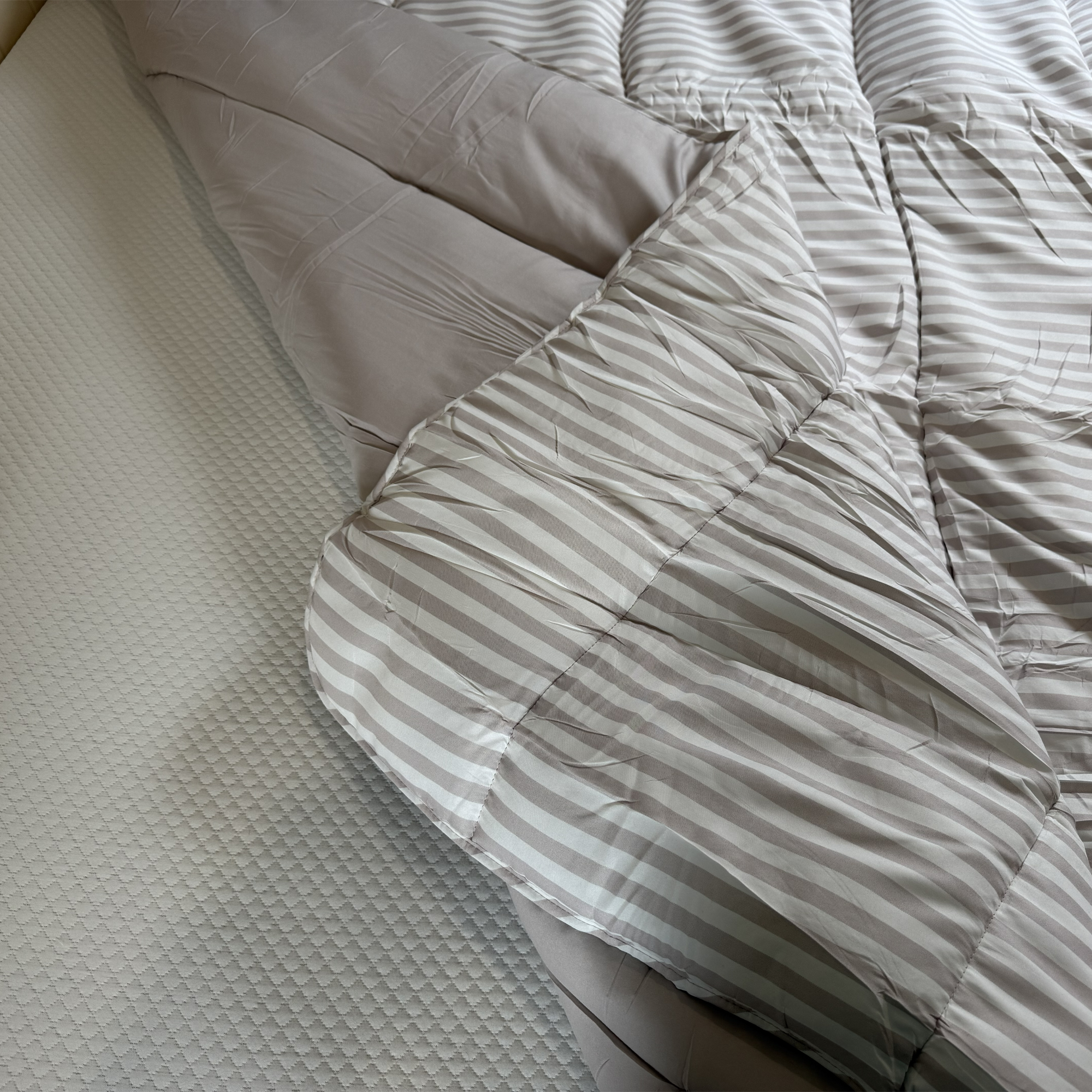 Dunelm striped coverless duvet being tested at home