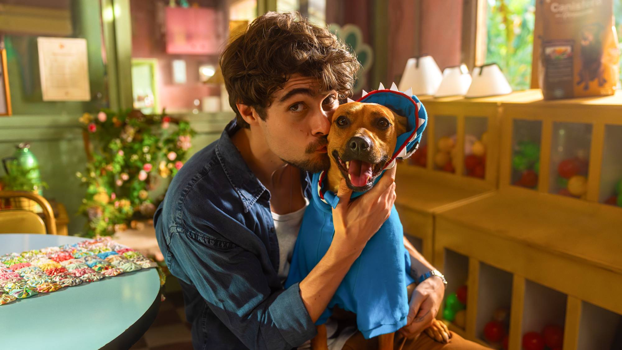 (L-R) Rafael Vitti as Pedro and Amendoim as Caramelo in Netflix's "Caramelo"
