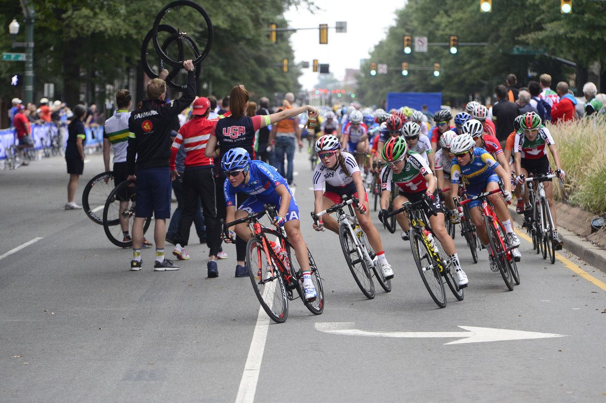 The riders flying through a corner downtown
