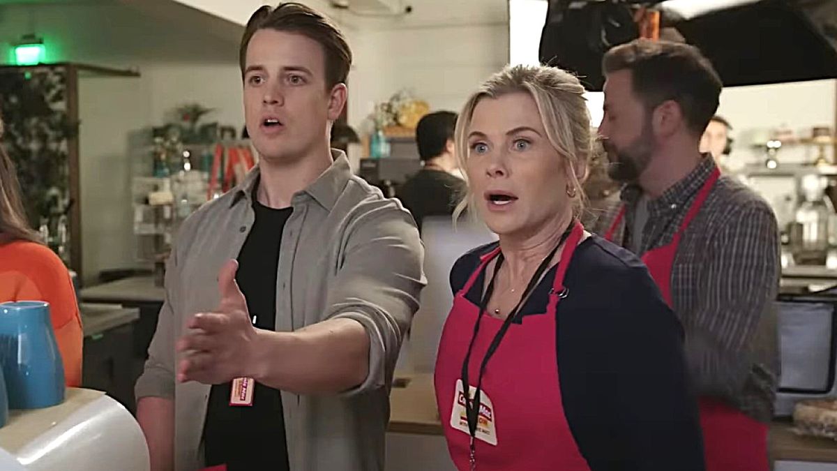 Gavin Langelo as Hunt Bantry and Alison Sweeney as Hannah Swensen look shocked in a screenshot from Reality Bites: A Hannah Swensen Mystery.