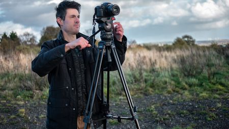 The Sachtler Ace M MS Mk II video tripod in an outdoors environment