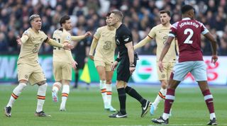 Chelsea's players appeal to referee Craig Pawson during the Premier League match between West Ham United and Chelsea at the London Stadium in London, United Kingdom on 11 February, 2023.