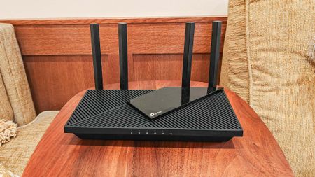 TP- Link Archer AX55 sitting on desk