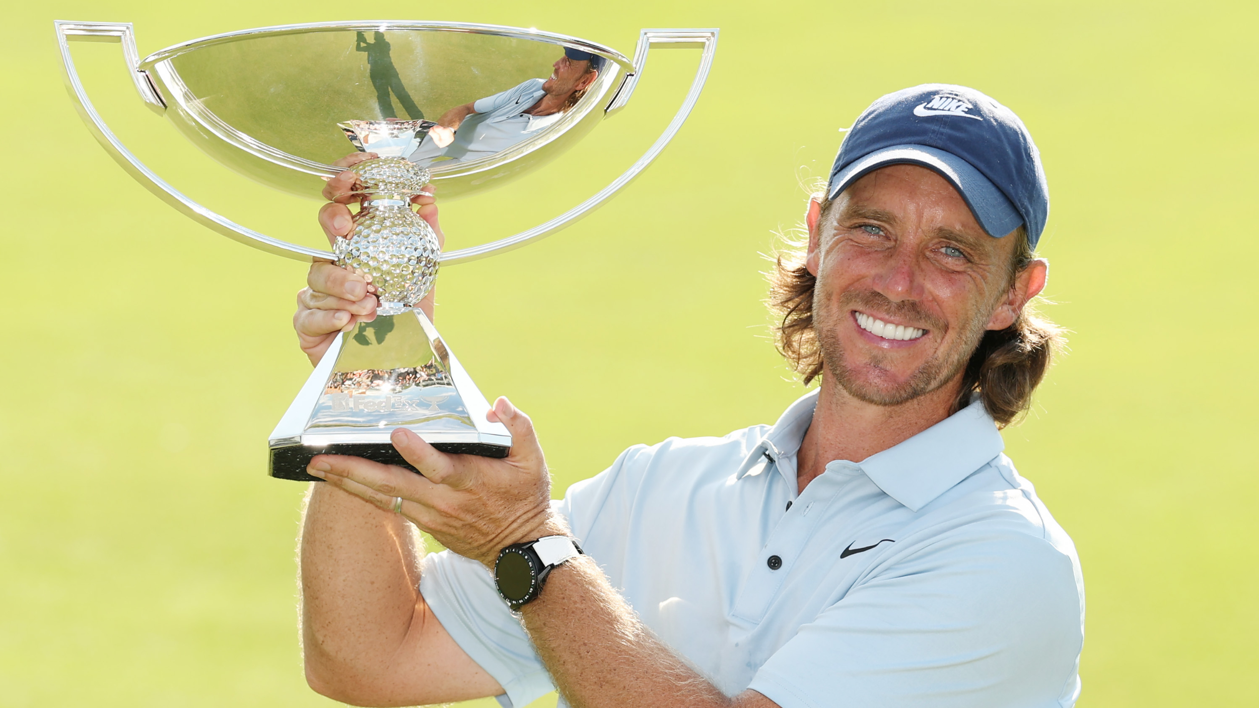 Tommy Fleetwood with the FedExCup trophy