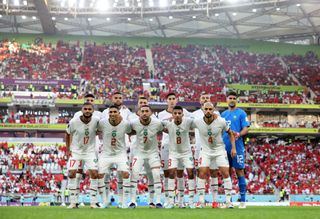 Morocco players line up for team photos prior to the FIFA World Cup Qatar 2022 Group F match between Belgium and Morocco at Al Thumama Stadium on November 27, 2022 in Doha, Qatar.
