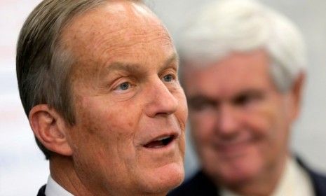 Todd Akin, accompanied by Newt Gingrich, speaks at a campaign event in Lee&amp;#039;s Summit, Mo., on Oct. 30. 