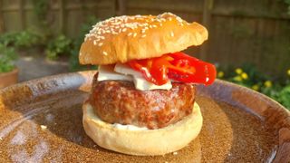 A Wagyu beef burger on a plate