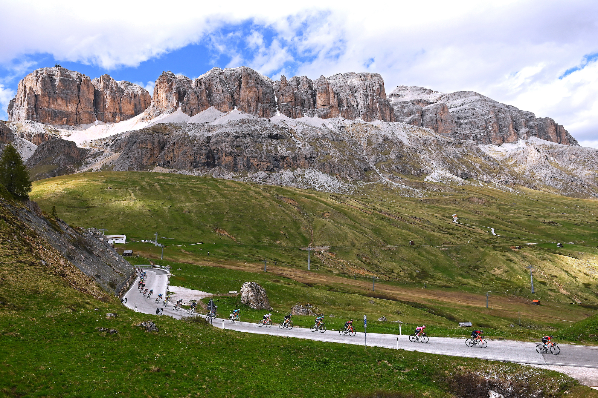 The peloton rides through the Dolomites on stage 20 of the Giro d'Italia 2022