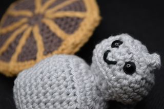 A close-up of NASA's Lucy asteroid spacecraft in crochet form as crafted by Daisy Dobrijevic of All About Space.