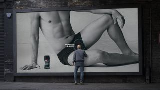 Lynx scratch and sniff billboard