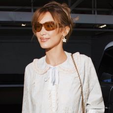 Bella Hadid elevated her bootcut Levi's jeans with the peasant blouse top trend