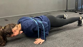 Pippa Sealey performing banded push-up with resistance band