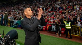 Manchester United midfielder Casemiro applauds the Manchester United fans after being unveiled ahead of the Premier League match between Manchester United and Liverpool FC at Old Trafford on August 22, 2022 in Manchester, England.