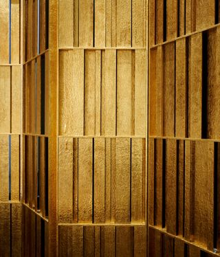 gold screens at Chanel boutique, 18 Place Vendôme Paris, with interiors by Peter Marino