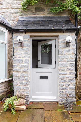 cottage lighting ideas – jess williams house cottage front door with outdoor light