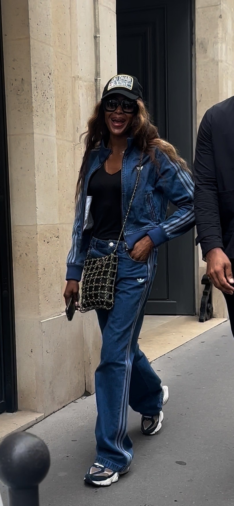 Naomi Campbell wearing New Balance 9060 sneakers during fashion week