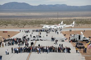 WhinteKnightTwo and VSS Eterprise appear on the Spaceport America runway during the runway dedication.