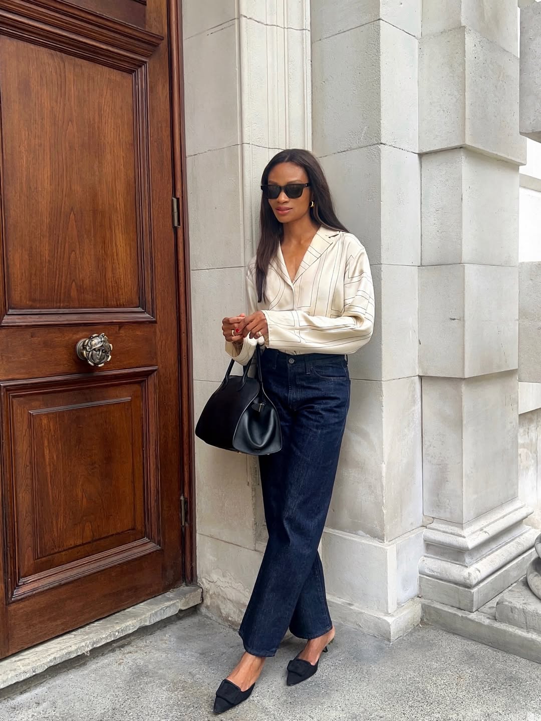 Lorna Sympathy wearing a silk shirt