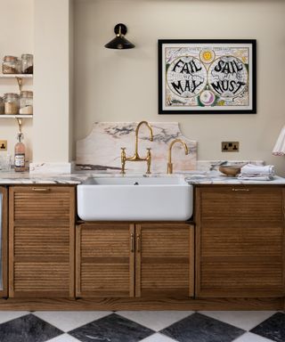 devol kitchens haberdashery cabinets pared with marble countertops and geometrics floors