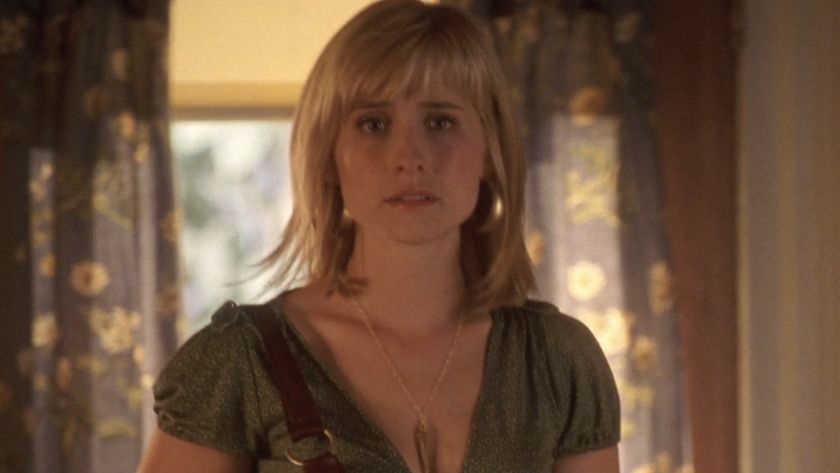 Chloe Sullivan (Allison Mack) walks into the Kent house on Smallville.