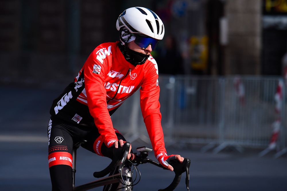 An Austrian rider is bundled up against the cold