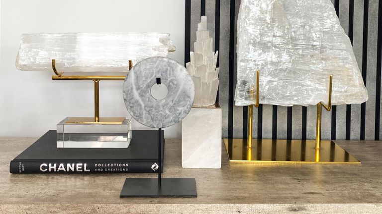 crystals on a desk with chanel coffee table book