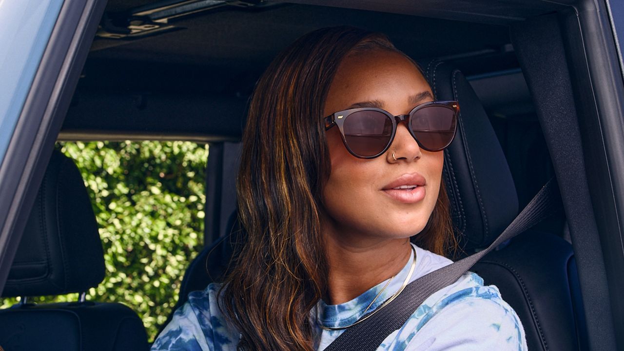 A person wearing the Amazon Echo Frames smart glasses