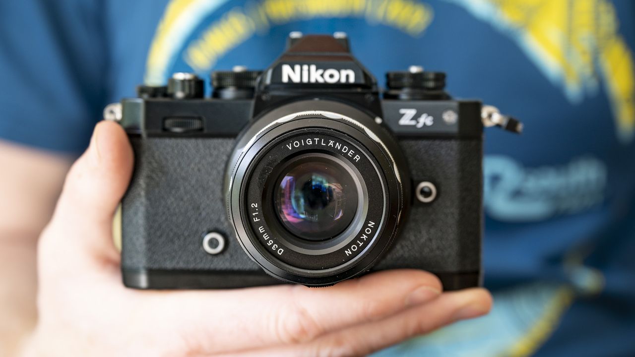 Voigtlander D 35mm f1.2 Nokton lens on a wooden table